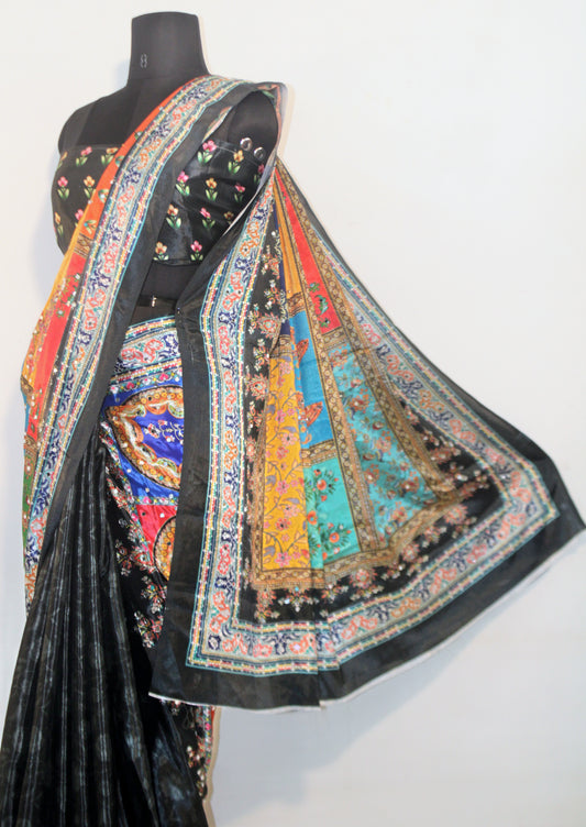 Close-up of mirror work on smoke black Chinon silk saree—highlighting artisanal sparkle and intricate craftsmanship.