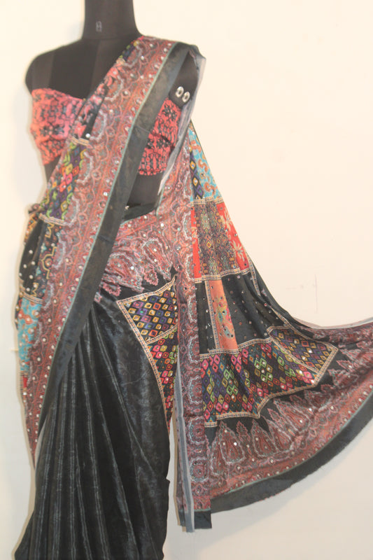 Close-up of mirror work on stone black Chinon silk saree—highlighting artisanal sparkle and intricate craftsmanship.