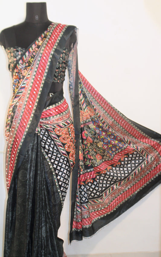 Close-up of mirror work on slate black Chinon silk saree—highlighting artisanal sparkle and intricate craftsmanship.