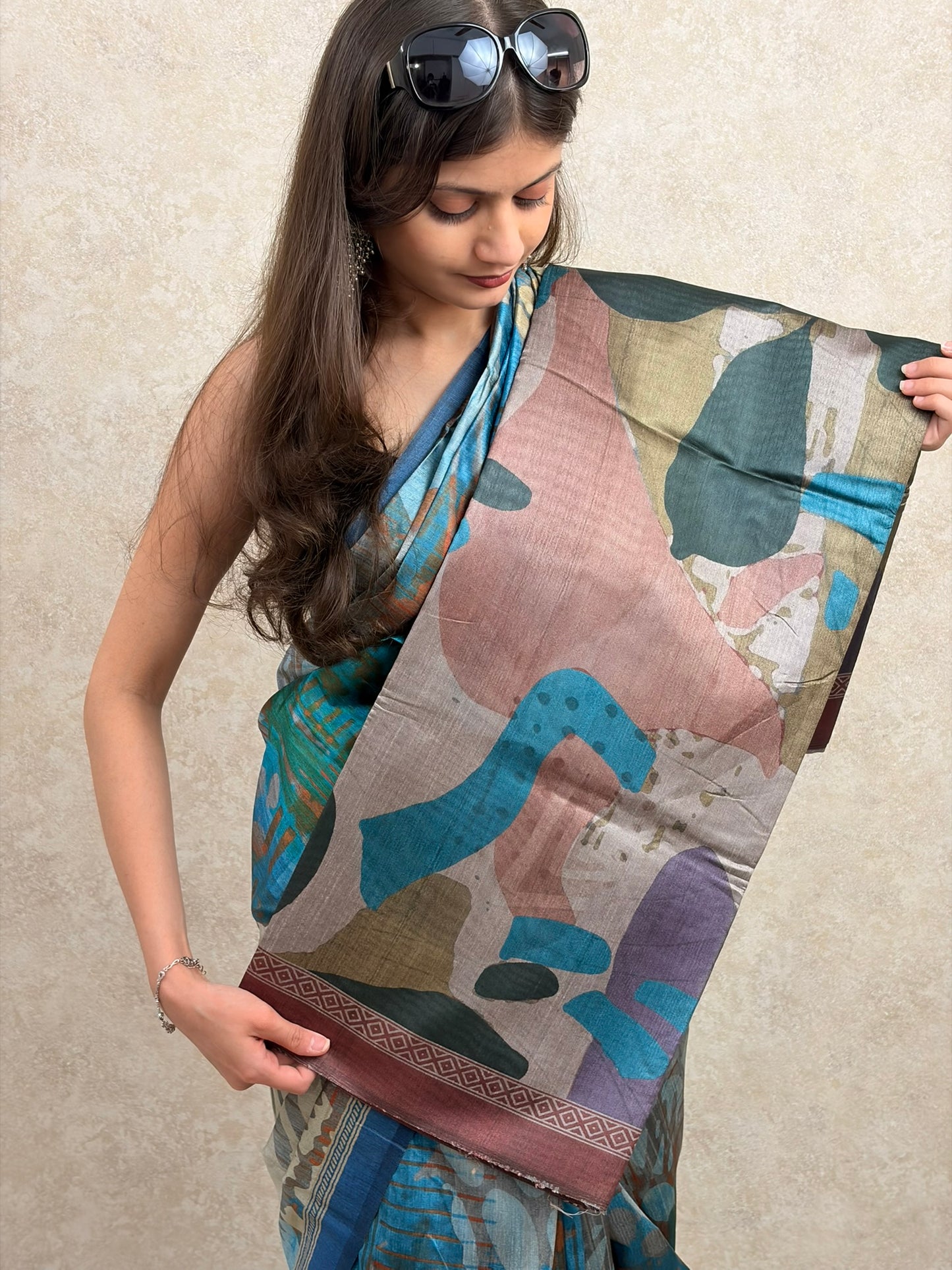Elegant woman in Art Silk Saree with all-over abstract patterns, perfect for festive flair