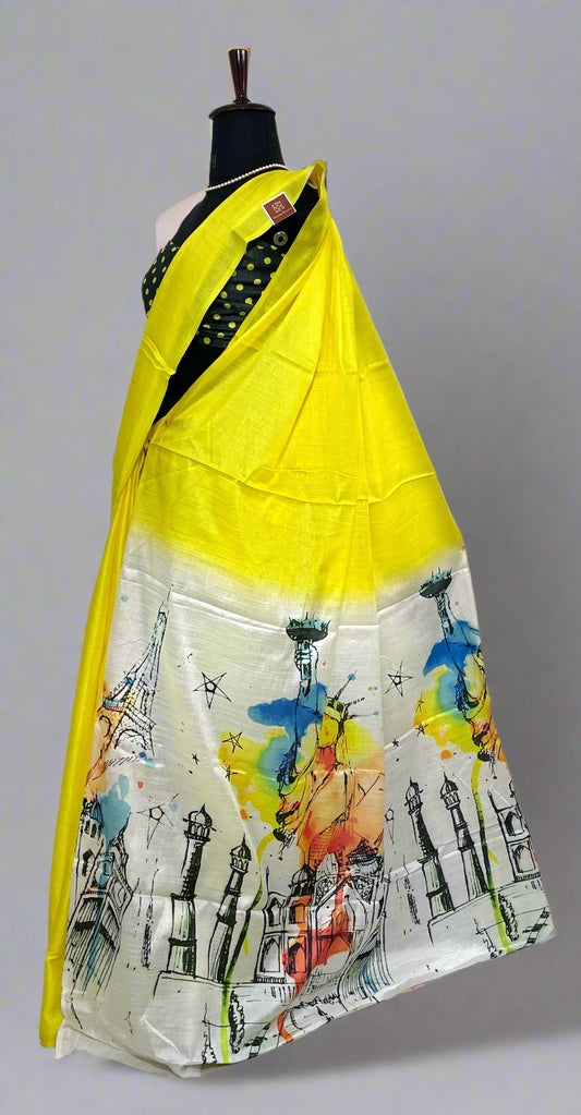 Maniqueen wearing lemon yellow cotton saree with Seven Wonders print on pallu—styled for breezy elegance and travel-inspired charm.