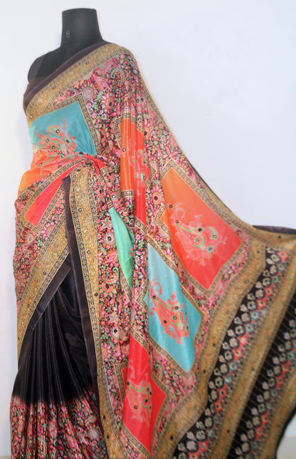 Close-up of mirror work on dark wine Chinon silk saree—highlighting artisanal sparkle and intricate craftsmanship.