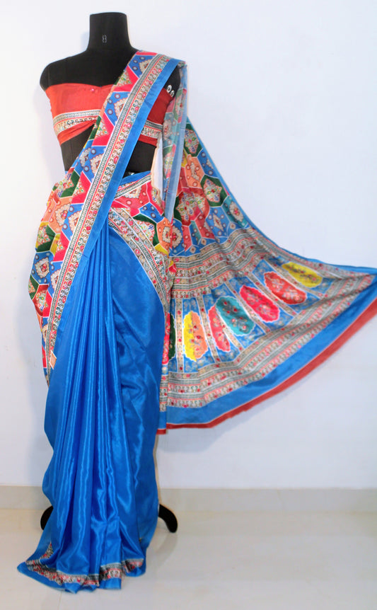 Maniqueen wearing Capri blue Chinon silk saree with mirror work—styled for Navaratri garba nights and festive elegance.