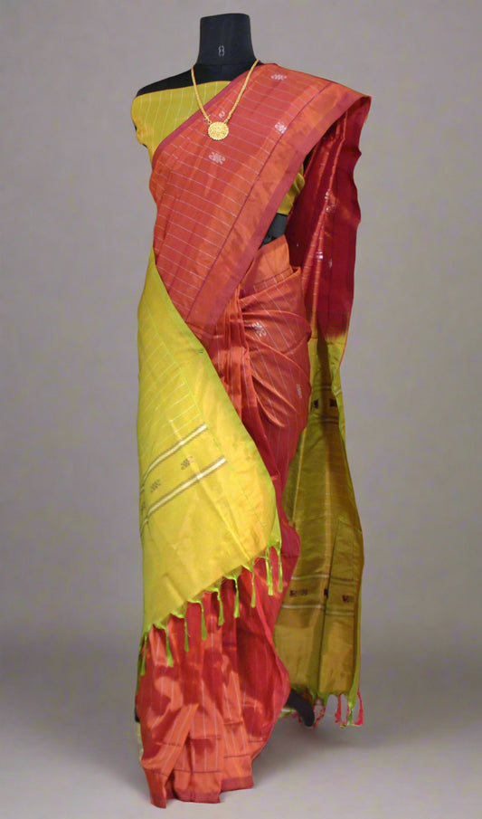 Maniqueen draped in Banana Pith saree with fine Resham lines and bold contrast Pallu, styled for eco-elegance and festive charm.