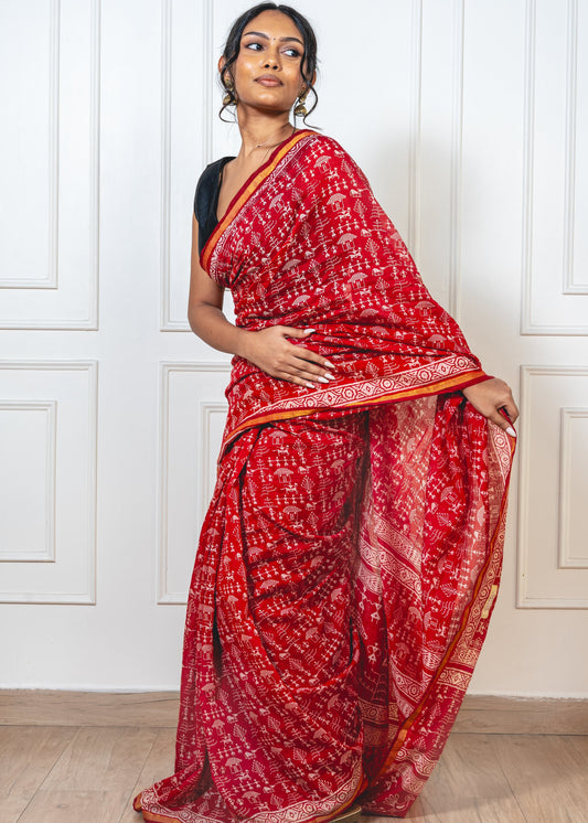 Chanderi cotton Red saree with warli print and thin golden zari border
