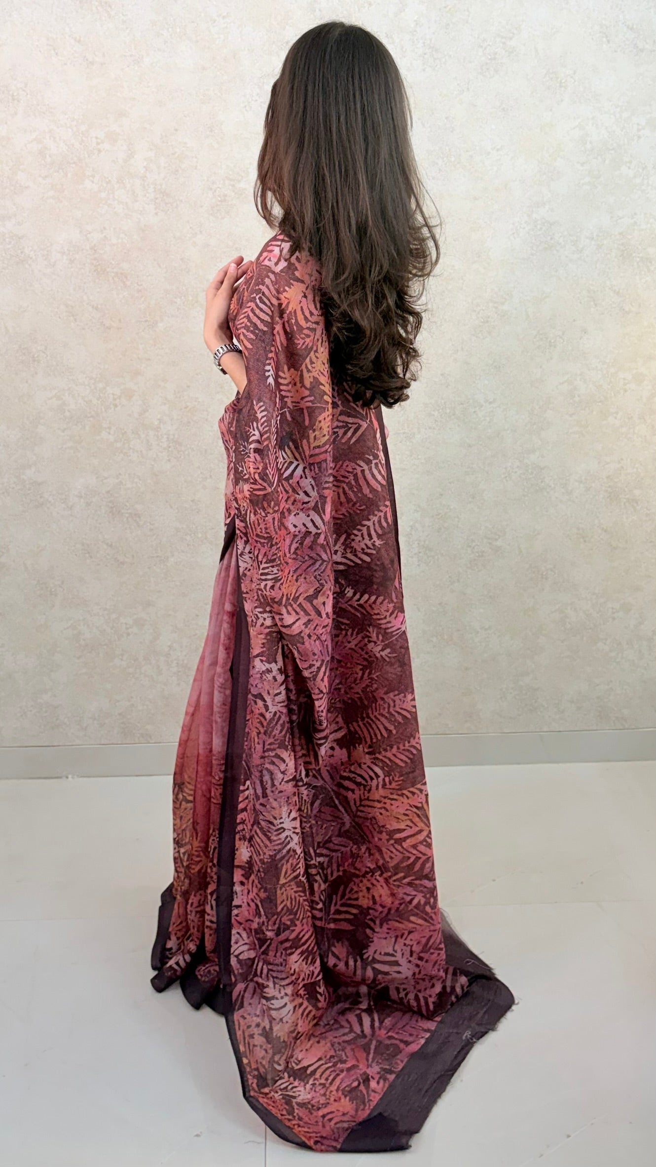 Model draped in Art Silk Saree featuring nature-inspired leaf motifs and graceful texture