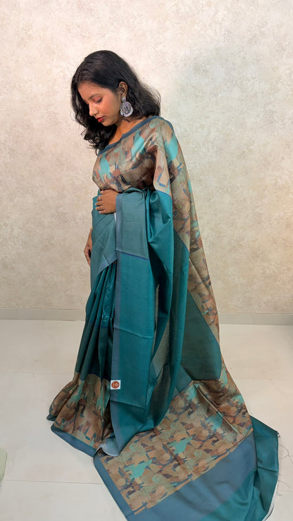 Woman wearing Art Silk Saree with abstract border print, styled for festive elegance