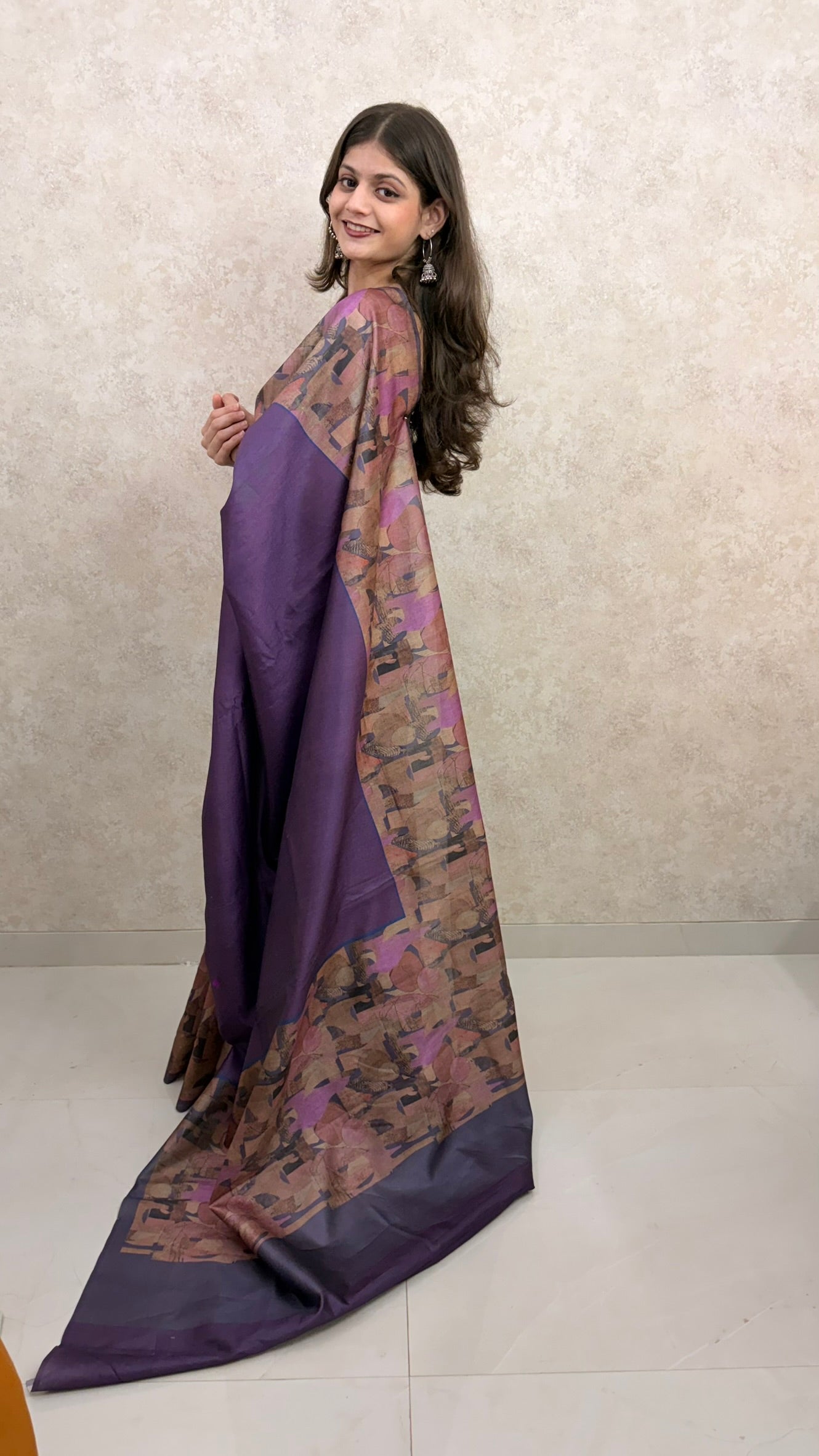 Graceful pose in Art Silk Saree with colorful abstract border detailing