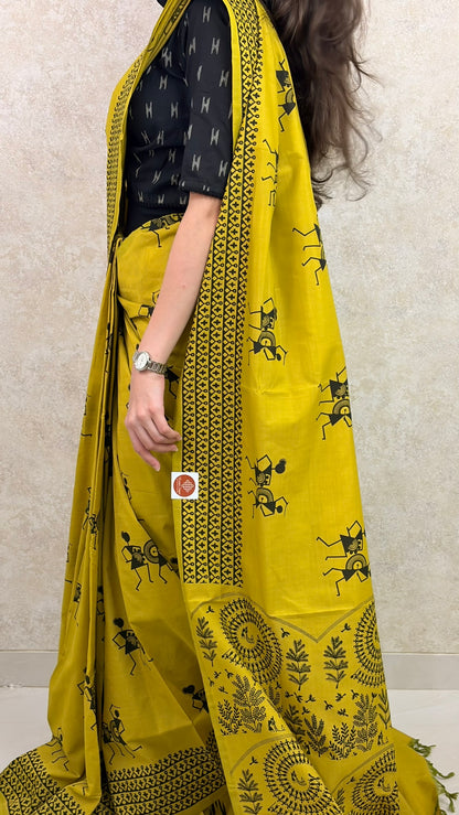 Female model showcasing Cotton Silk Saree with ethnic block prints in rich colors