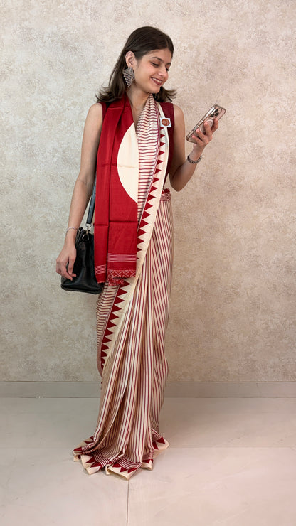 Elegant woman in Modal Sari Mood with bold vertical stripes, blending tradition and contemporary style