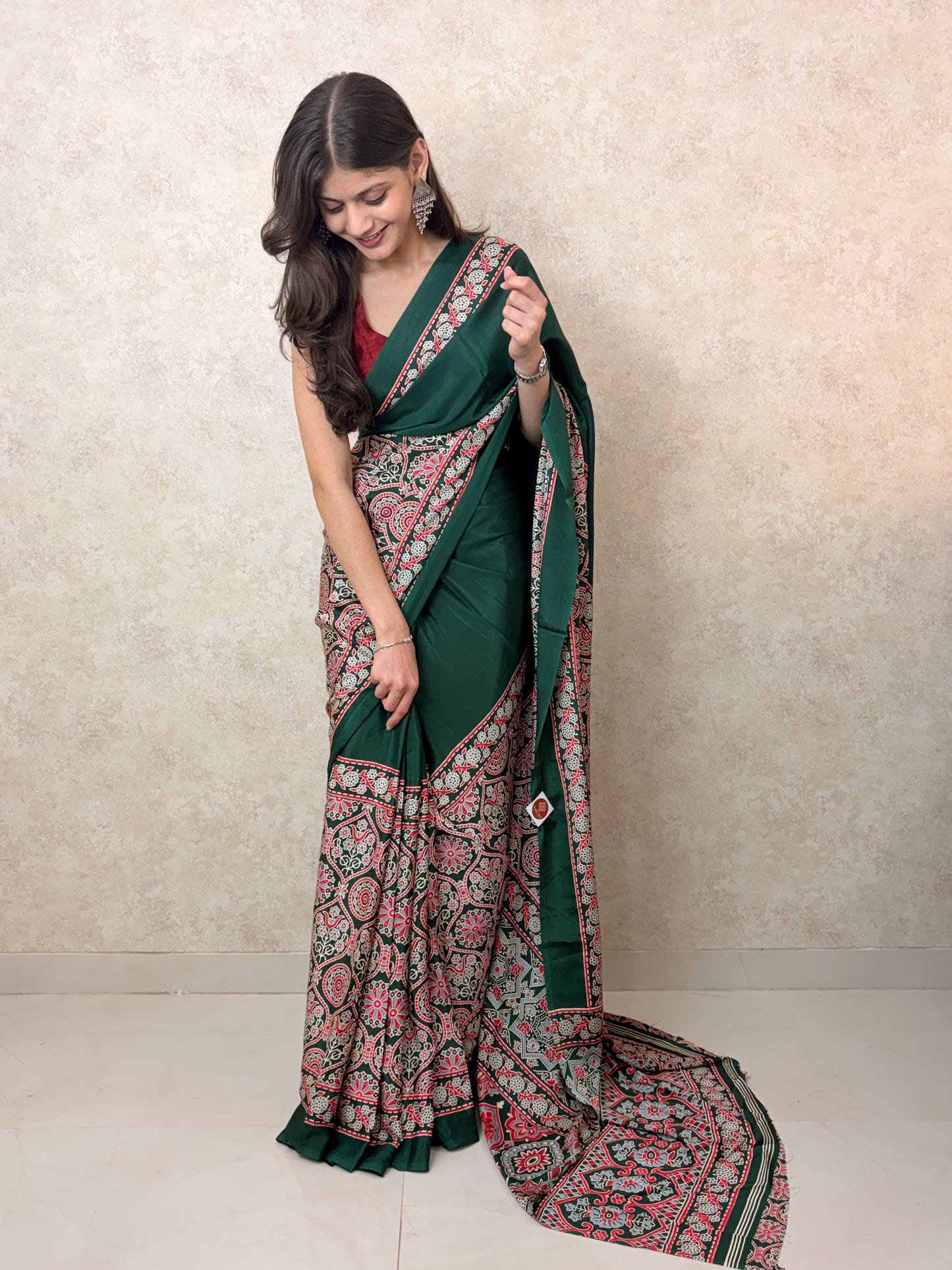 Model draped in Ajrakh Allure Modal Silk Saree, showcasing handcrafted design and graceful charm