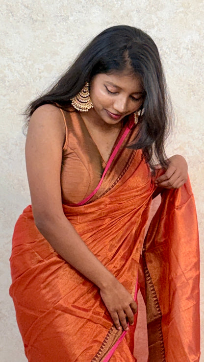 Elegant Tissue Saree with Reshim Border – Grace Meets Tradition