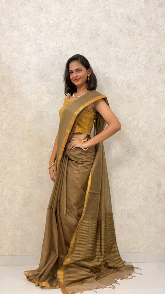Plain Kota Doria Saree with a delicate golden border