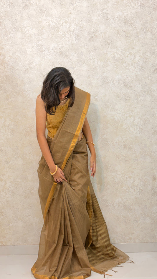 Plain Kota Doria Saree with a delicate golden border