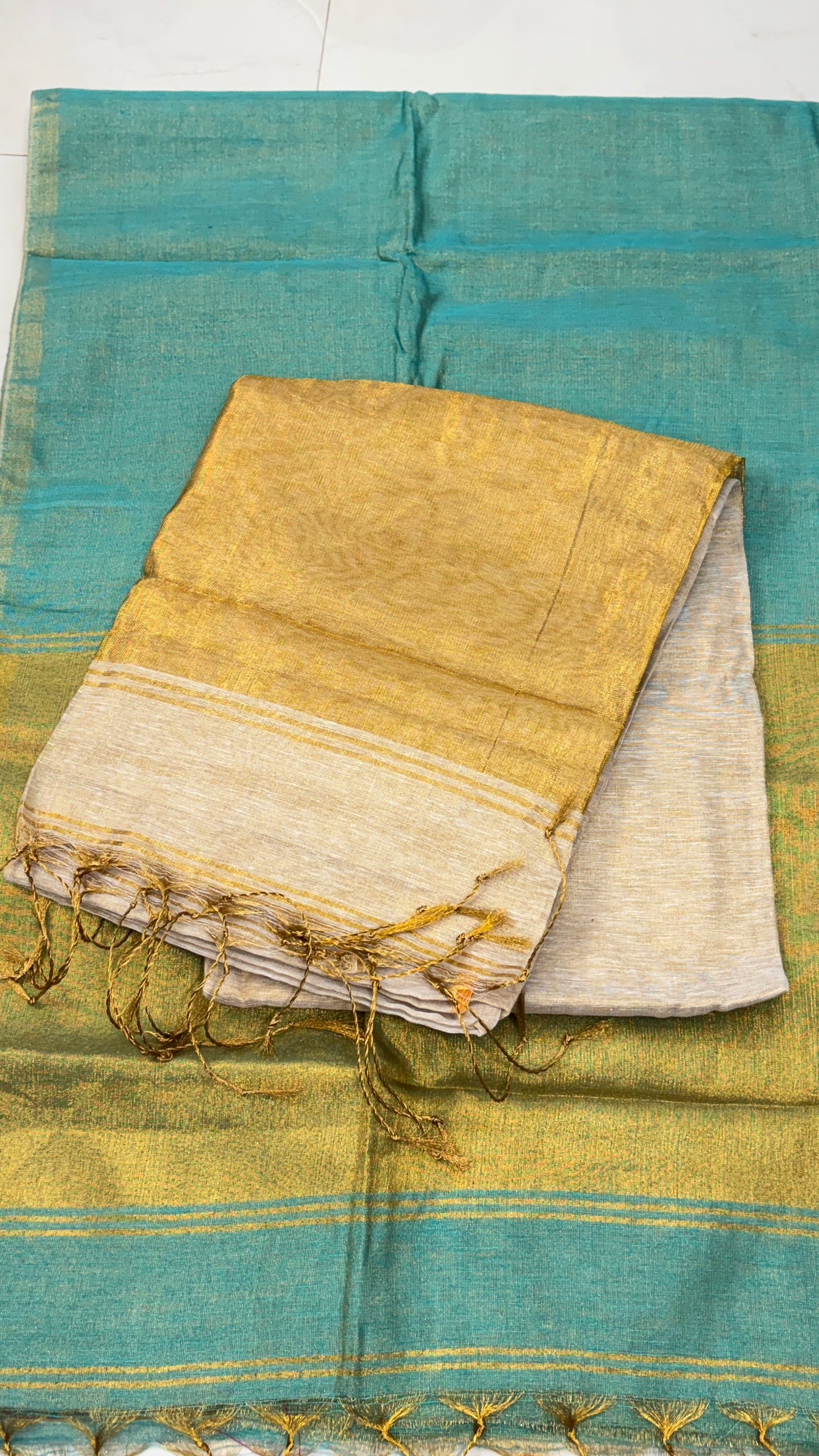 Khadi Tissue Saree with  Thin Golden border :Ideal for small festive occasions