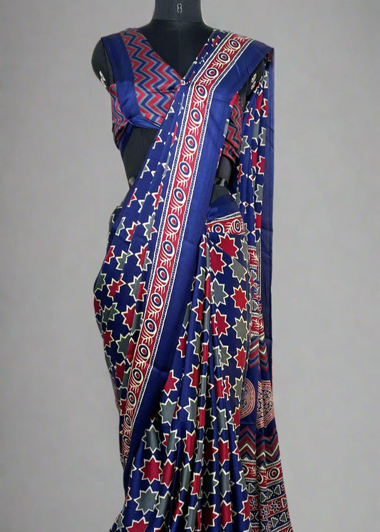 Royal blue Modal silk saree with flowing pallu and crisp pleats—capturing graceful movement and refined elegance
