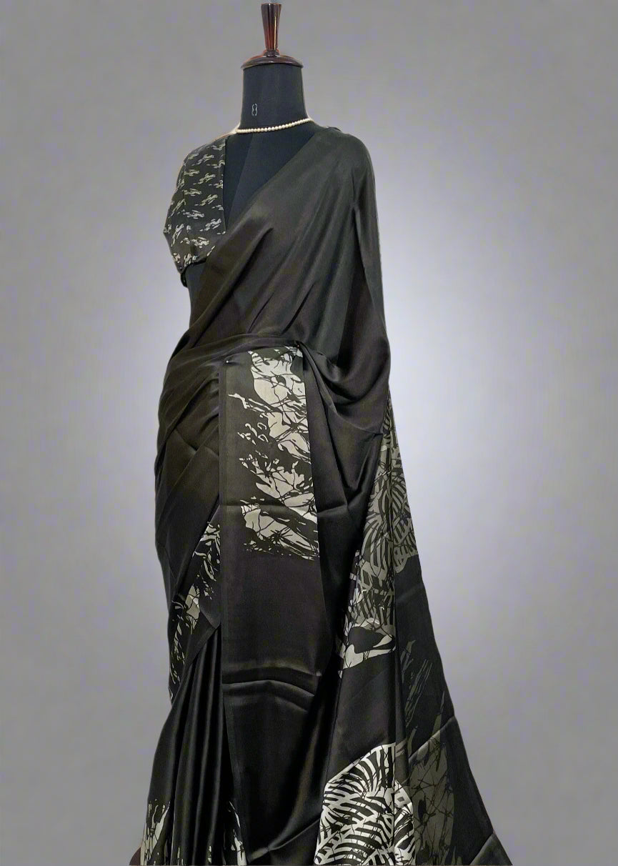 Mannequin wearing Black Modal silk saree with silver abstract print—styled for evening wear, festive gatherings, and modern elegance.