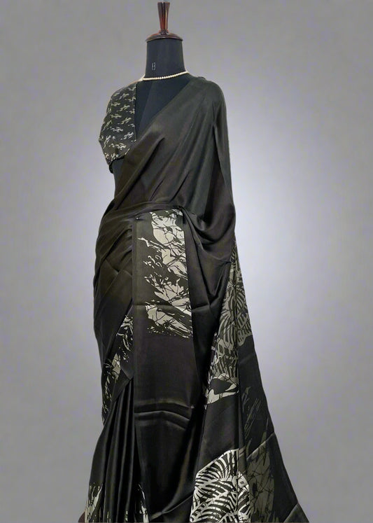 Mannequin wearing Black Modal silk saree with silver abstract print—styled for evening wear, festive gatherings, and modern elegance.