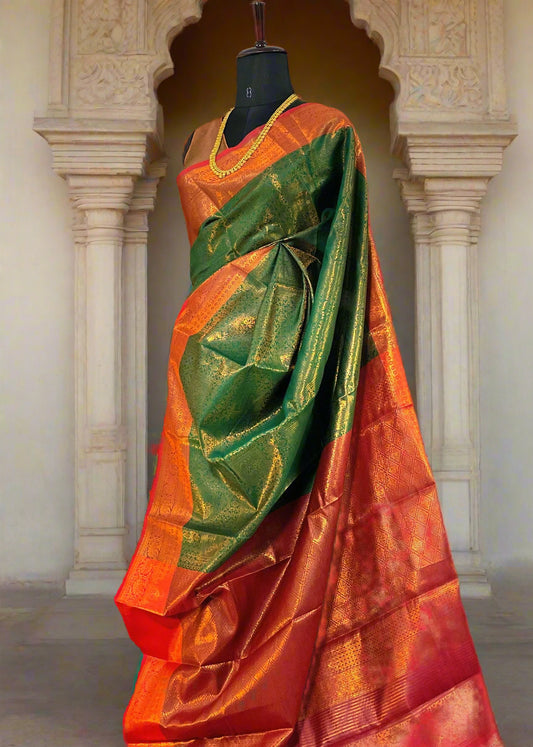 Close-up of golden zari weaving on green Mysore semi silk saree—highlighting intricate craftsmanship and regal shimmer.