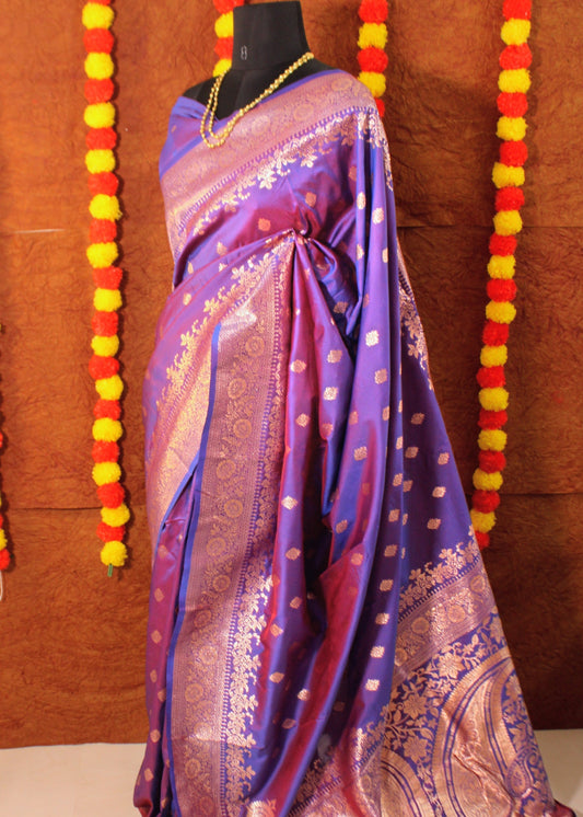 Maniqueen draped in Banarasi Semi Silk saree with royal weaves and grand borders—styled for festive opulence and timeless grace.