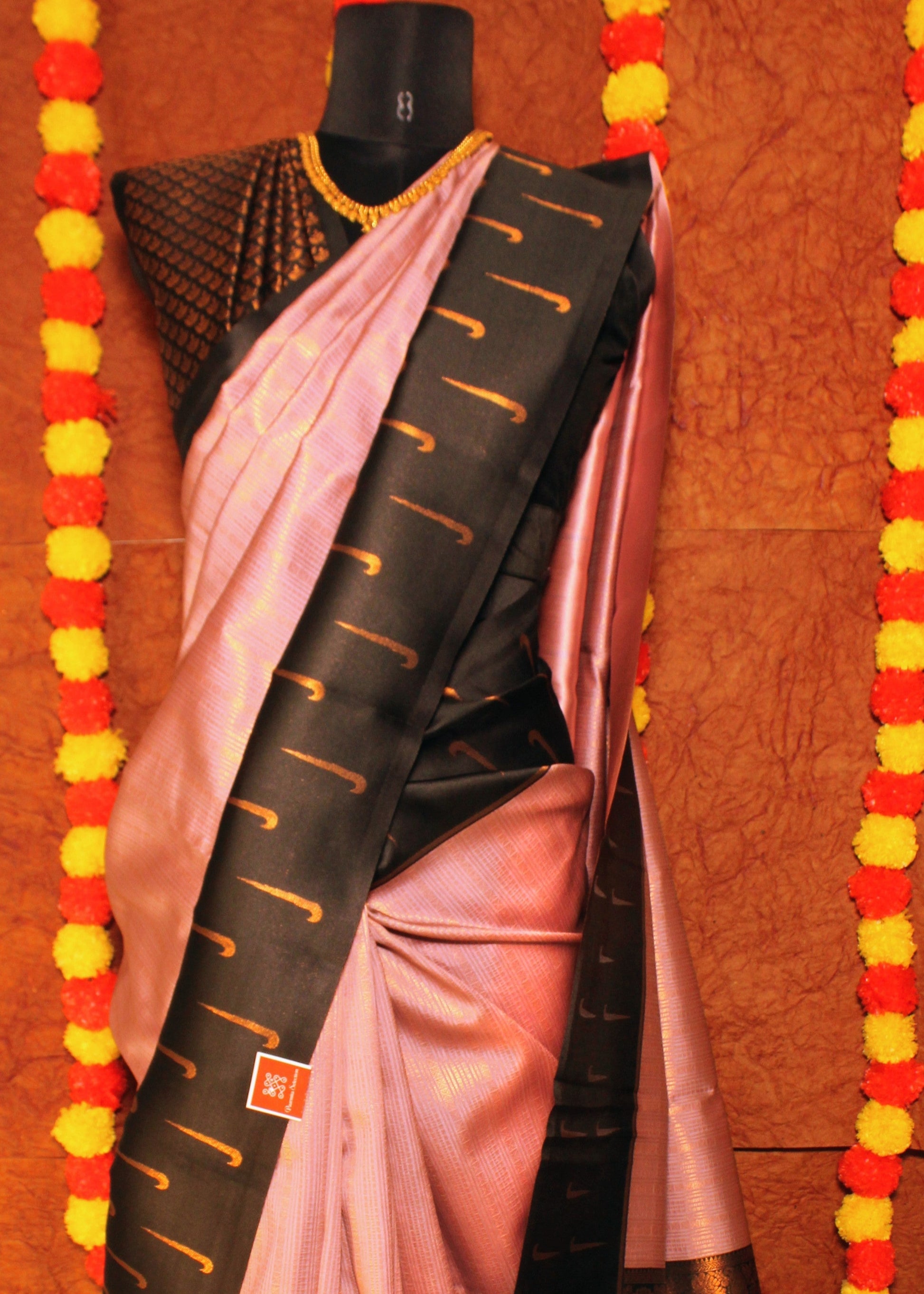 Woman wearing semi Kanchi silk saree with Muniya butta border and contrast pallu—styled for festive rituals, temple visits, and graceful gatherings.