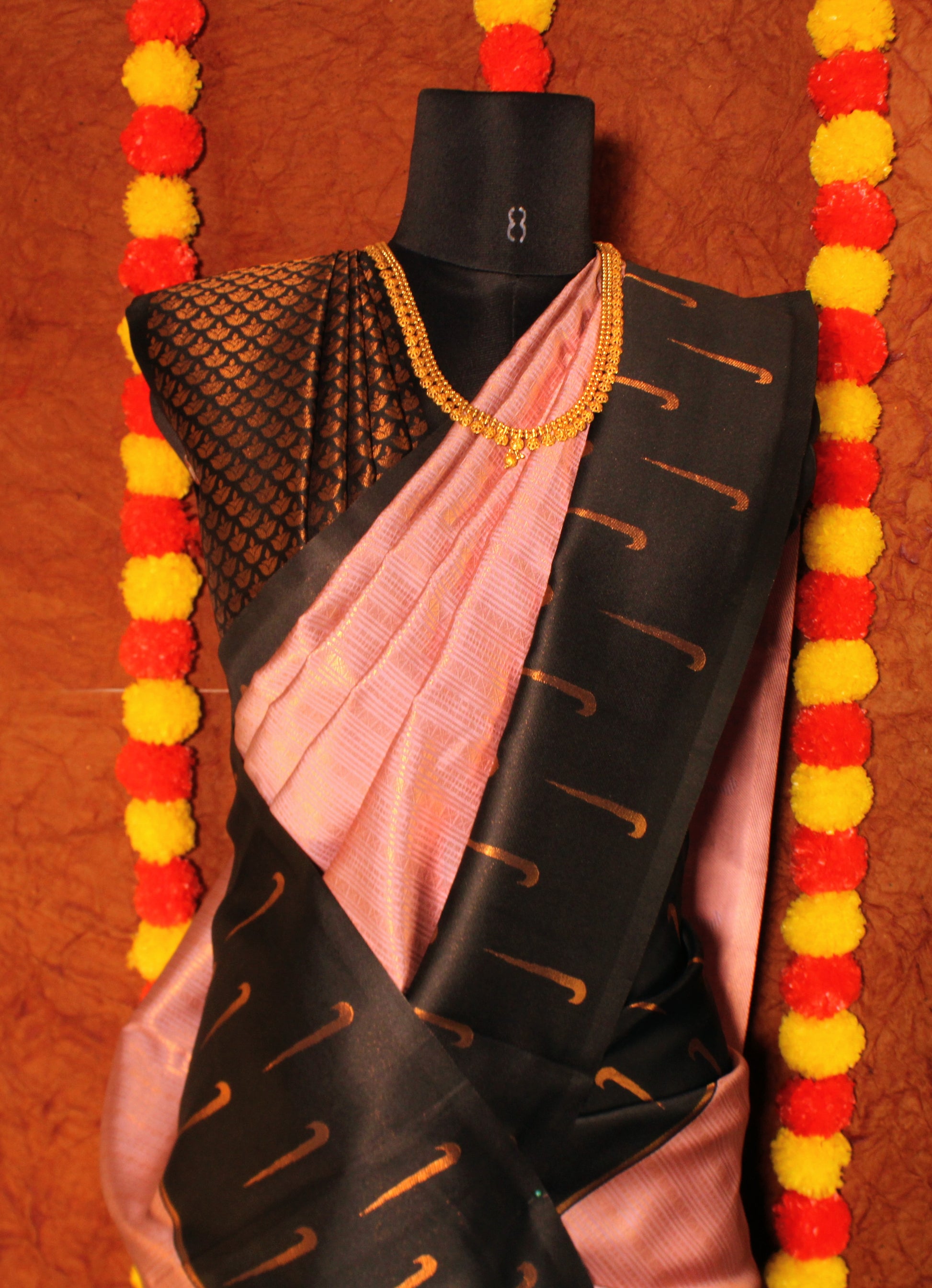 Close-up of Muniya butta border on semi Kanchi silk saree—highlighting intricate weaving and cultural symbolism.