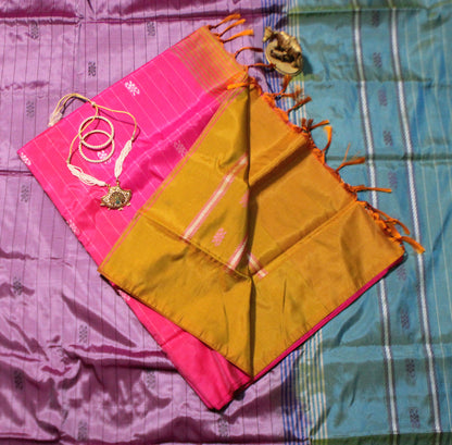 Dark pink Banana Pith saree with linear Resham work and vivid contrast blouse—blending festive vibrance with handcrafted finesse