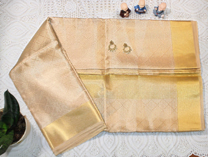Gold saree with elegant pleats and glowing pallu—evoking Jyothika’s luminous charm and festive grandeur.