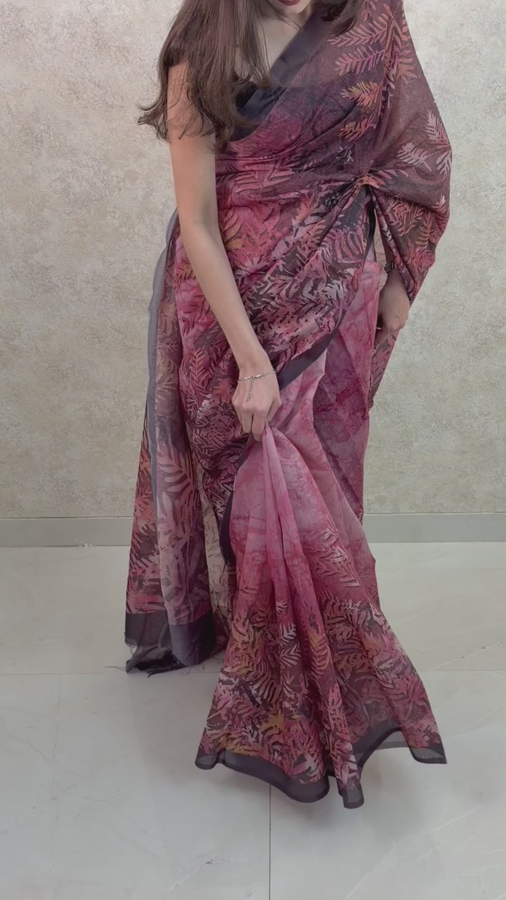 Graceful pose in Art Silk Saree with colorful leaf prints, perfect for cultural celebrations