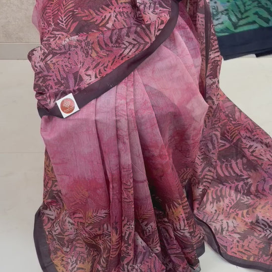 Female model showcasing Variants of Art Silk Saree with soft sheen and artistic leaf patterns